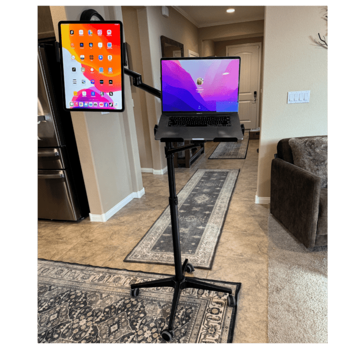 Today, we're putting together the Viozon Tablet and Laptop Floor Stand. Right out of the box and it's super simple to assemble. This stand's a gem - it's height adjustable, perfect for any position, standing or sitting. And those arms? They swing and rotate 360 degrees - super flexible for any angle you need. The build quality is top-notch too, with a premium solid aluminium alloy and smooth-rolling wheels for easy movement. I love how it's not just functional but also sleek with its silver finish and tidy cable management. Now, let's test it out with my tablet and laptop - fits perfectly and securely. A stylish and practical addition to any space, absolutely a must-have. Don’t forget to like and follow for more cool finds like this. Catch you in the next one